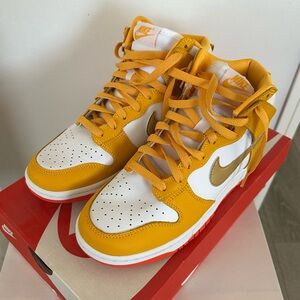 Nike Dunk High in University Gold and Metallic Gold